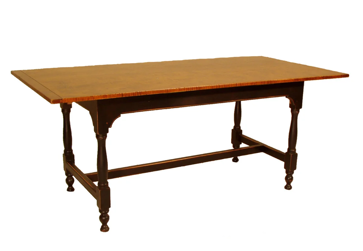Stretcher-base dining table