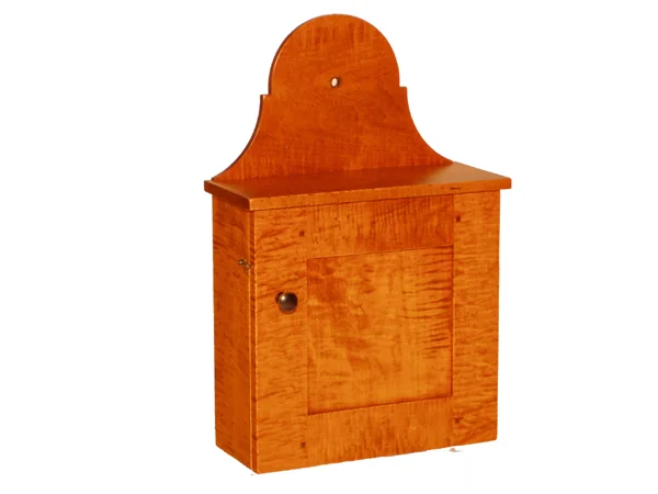 Curly maple hanging wall box with a shaped crest